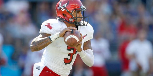 SEATTLE, WA - SEPTEMBER 06: Quarterback Vernon Adams Jr. #3 of the Eastern Washington Eagles looks downfield to pass against the Washington Huskies on September 6, 2014 at Husky Stadium in Seattle, Washington. (Photo by Otto Greule Jr/Getty Images)