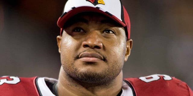 Aug 16, 2014; Minneapolis, MN, USA; Arizona Cardinals defensive end Calais Campbell (93) rests along the sidelines in the game with the Minnesota Vikings at TCF Bank Stadium. Mandatory Credit: Bruce Kluckhohn-USA TODAY Sports