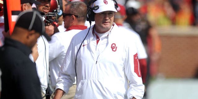 Oct 3, 2015; Norman, OK, USA; Oklahoma Sooners head coach Bob Stoops watches his team in action against the West Virginia Mountaineers in the first quarter at Gaylord Family - Oklahoma Memorial Stadium. Mandatory Credit: Mark D. Smith-USA TODAY Sports