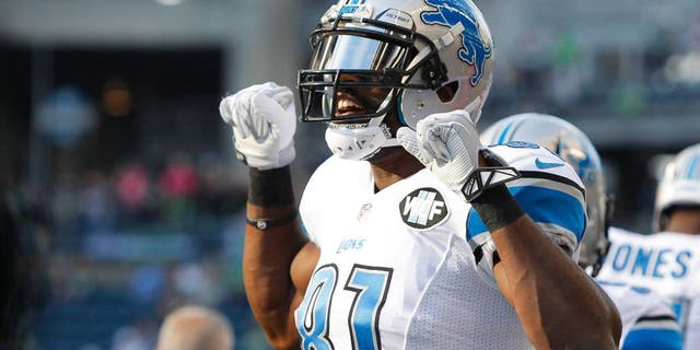 Oct 5, 2015; Seattle, WA, USA; Detroit Lions wide receiver Calvin Johnson (81) greets his teammates during pre game warmups against the Seattle Seahawks at CenturyLink Field. Mandatory Credit: Joe Nicholson-USA TODAY Sports