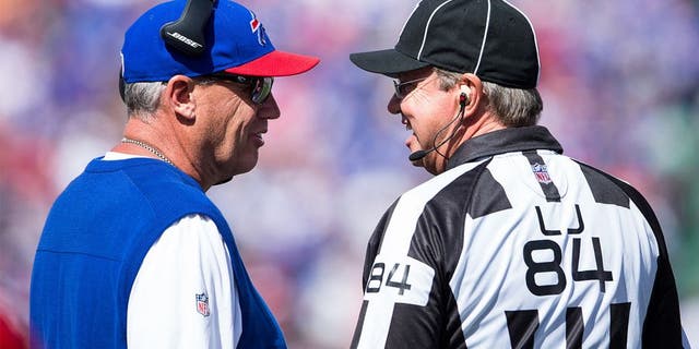 ORCHARD PARK, NY - SEPTEMBER 20: Head coach Rex Ryan of the Buffalo Bills speaks with line judge Mark Steinkerchner #84 during the first half against the New England Patriots on September 20, 2015 at Ralph Wilson Stadium in Orchard Park, New York. New England defeats Buffalo 40-32. (Photo by Brett Carlsen/Getty Images)