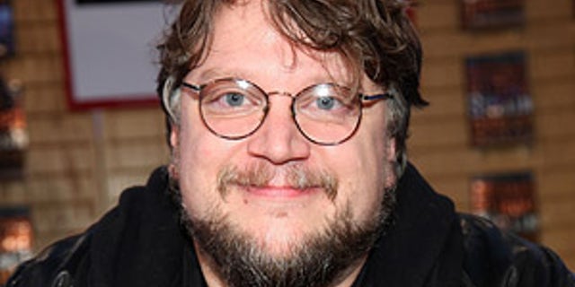 Director Guillermo del Toro poses at the book signing for his new book "The Strain" at Borders Books & Music on June 2, 2009 in Los Angeles, California.
Guillermo del Toro Signs Copies Of His New Book "The Strain" - Los Angeles
Borders Books & Music
Westwood, Los Angeles, CA United States
June 2, 2009
Photo by Brian To/FilmMagic.com
To license this image (57589145), contact FilmMagic.com