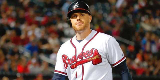 Freddie Freeman #5 of the Atlanta Braves reacts after flying out in the seventh inning against the Washington Nationals at Turner Field on October 1, 2015 in Atlanta, Georgia. (Photo by Kevin C. Cox/Getty Images)