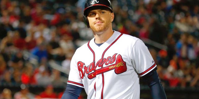 Freddie Freeman #5 of the Atlanta Braves reacts after flying out in the seventh inning against the Washington Nationals at Turner Field on October 1, 2015 in Atlanta, Georgia. (Photo by Kevin C. Cox/Getty Images)