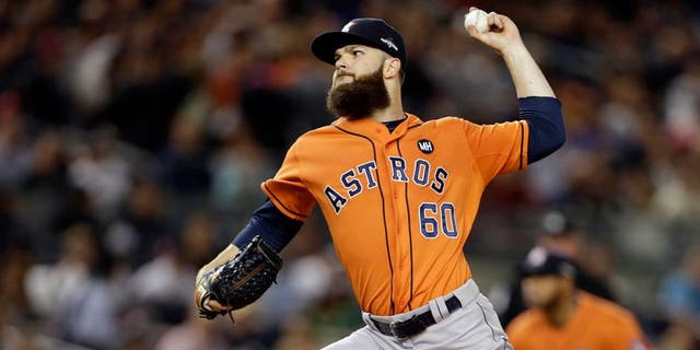 Oct 6, 2015; Bronx, NY, USA; Houston Astros starting pitcher Dallas Keuchel (60) throws against the New York Yankees during the first inning in the American League Wild Card playoff baseball game at Yankee Stadium. Mandatory Credit: Adam Hunger-USA TODAY Sports