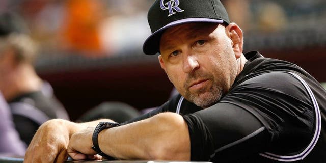 PHOENIX, AZ - SEPTEMBER 30: Manager Walt Weiss #22 of the Colorado Rockies looks on from the dugout during the MLB game against the Arizona Diamondbacks at Chase Field on September 30, 2015 in Phoenix, Arizona. (Photo by Christian Petersen/Getty Images)
