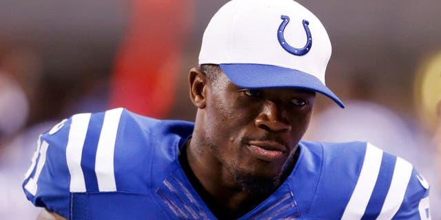 Sep 3, 2015; Indianapolis, IN, USA; Indianapolis Colts wide receiver Andre Johnson (81) watches from the bench during a game against the Cincinnati Bengals at Lucas Oil Stadium. Mandatory Credit: Brian Spurlock-USA TODAY Sports