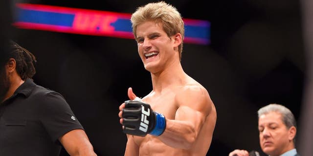 HOUSTON, TX - OCTOBER 03: Sage Northcutt celebrates after defeating Francisco Trevino in their lightweight bout during the UFC 192 event at the Toyota Center on October 3, 2015 in Houston, Texas. (Photo by Jeff Bottari/Zuffa LLC/Zuffa LLC via Getty Images)
