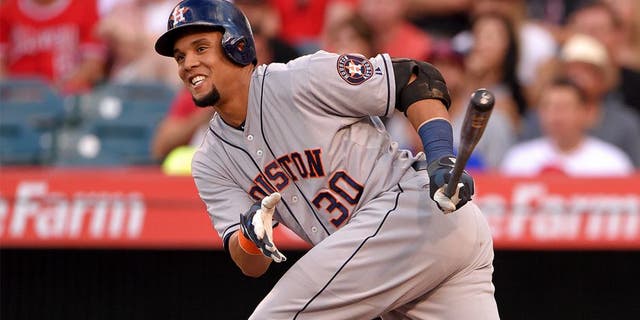 ANAHEIM, CA - SEPTEMBER 12: Carlos Gomez #30 of the Houston Astros runs during the first inning of the game against the Los Angeles Angels of Anaheim at Angel Stadium of Anaheim on September 12, 2015 in Anaheim, California. (Photo by Matt Brown/Angels Baseball LP/Getty Images)