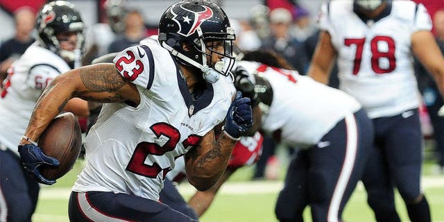 ATLANTA, GA - OCTOBER 04: Arian Foster #23 of the Houston Texans runs the ball in the first half against the Atlanta Falcons at the Georgia Dome on October 4, 2015 in Atlanta, Georgia. (Photo by Scott Cunningham/Getty Images)