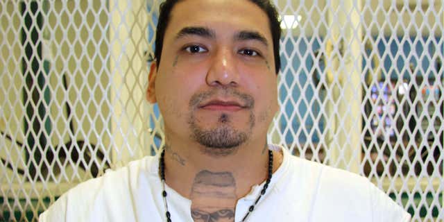 Sept. 2, 2015: Death row inmate Juan Garcia is photographed in a visiting cage at the Texas Department of Criminal Justice Polunsky Unit near Livingston, Texas.