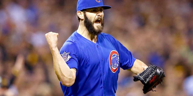 PITTSBURGH, PA - OCTOBER 07: Jake Arrieta #49 of the Chicago Cubs reacts after a double play to end the sixth inning with the bases loaded during the National League Wild Card game against the Pittsburgh Pirates at PNC Park on October 7, 2015 in Pittsburgh, Pennsylvania. (Photo by Jared Wickerham/Getty Images)