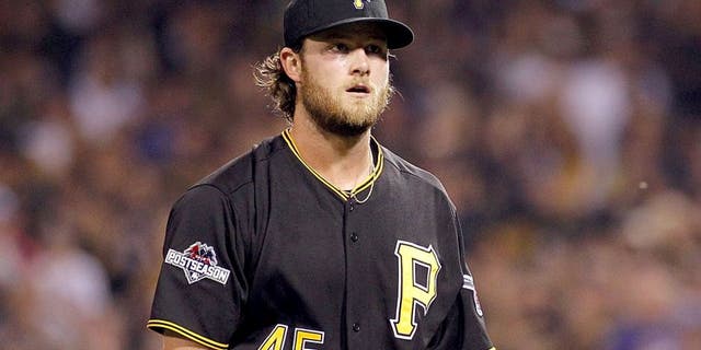 PITTSBURGH, PA - OCTOBER 07: Gerrit Cole #45 of the Pittsburgh Pirates walks off the field after the first inning against the Chicago Cubs during the National League Wild Card game at PNC Park on October 7, 2015 in Pittsburgh, Pennsylvania. (Photo by Justin K. Aller/Getty Images)