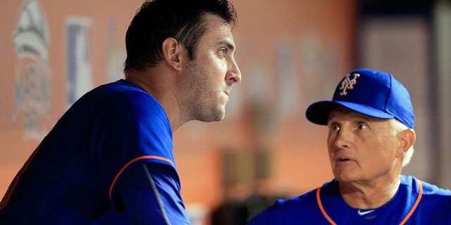 Aug 5, 2015; Miami, FL, USA; New York Mets manager Terry Collins (right) talks with starting pitcher Matt Harvey in the eighth inning of a game against the Miami Marlins at Marlins Park. The Mets won 8-6. Mandatory Credit: Robert Mayer-USA TODAY Sports