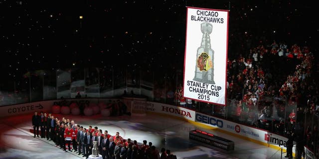 CHICAGO, IL - OCTOBER 07: The 2015 Championship banner is raised before the Chicago Blackhawks take on the New York Rangers during an NHL game at the United Center on October 7, 2015 in Chicago, Illinois. (Photo by Jonathan Daniel/Getty Images)