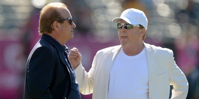 Oct 12, 2014; Oakland, CA, USA; San Diego Chargers president Dean Spanos (left) and Oakland Raiders owner Mark Davis before the game at O.co Coliseum. Mandatory Credit: Kirby Lee-USA TODAY Sports