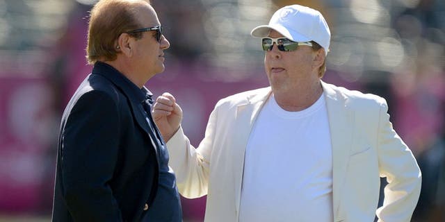 Oct 12, 2014; Oakland, CA, USA; San Diego Chargers president Dean Spanos (left) and Oakland Raiders owner Mark Davis before the game at O.co Coliseum. Mandatory Credit: Kirby Lee-USA TODAY Sports