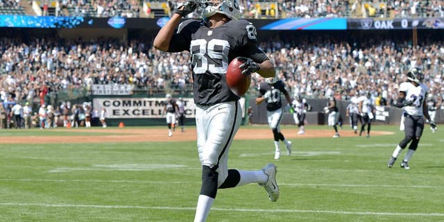 Sep 20, 2015; Oakland, CA, USA; Oakland Raiders receiver Amari Cooper (89) reacts after scoring on a 68-yard touchdown reception in the first quarter against the Baltimore Ravens as at O.co Coliseum. Mandatory Credit: Kirby Lee-USA TODAY Sports