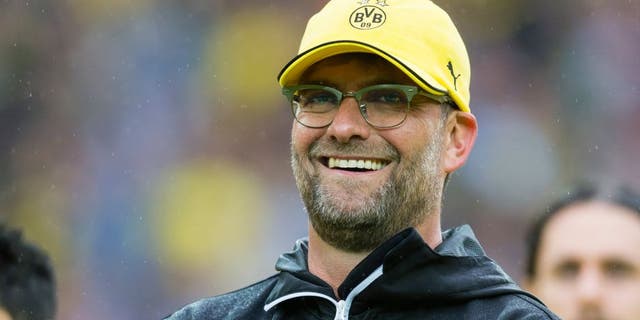 DORTMUND, GERMANY - May 23: Head coach Juergen Klopp of Borussia Dortmund is saying goodbye to the fans after the final whistle of his last home match for Borussia Dortmund during the Bundesliga match between Borussia Dortmund and SV Werder Bremen at Signal Iduna Park on May 23, 2015 in Dortmund, Germany. (Photo by Alexandre Simoes/Borussia Dortmund/Getty Images)