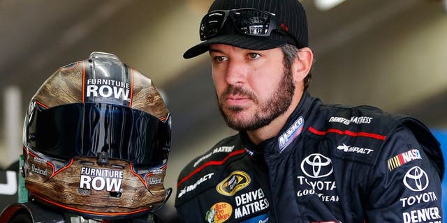 CHARLOTTE, NC - OCTOBER 06: Martin Truex Jr, driver of the #78 Furniture Row/Denver Mattress Toyota, prepares to drive during practice for the NASCAR Sprint Cup Series Bank of America 500 at Charlotte Motor Speedway on October 6, 2016 in Charlotte, North Carolina. (Photo by Jonathan Ferrey/NASCAR via Getty Images)