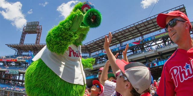 The Phillie Phanatic greets fans during a game against the Tampa Bay Rays at Citizens Bank Park in Philadelphia, July 22, 2015.