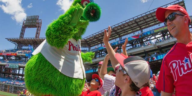 The Phillie Phanatic greets fans during a game against the Tampa Bay Rays at Citizens Bank Park in Philadelphia, July 22, 2015.