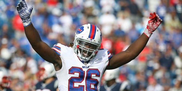 ORCHARD PARK, NY - SEPTEMBER 20: Boobie Dixon #26 of the Buffalo Bills tries to get the crowd fired up during NFL game action against the New England Patriots at Ralph Wilson Stadium on September 20, 2015 in Orchard Park, New York. (Photo by Tom Szczerbowski/Getty Images)