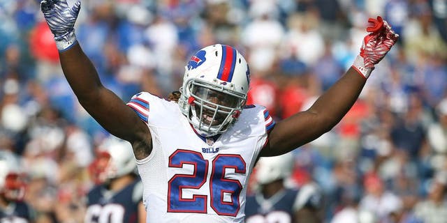 ORCHARD PARK, NY - SEPTEMBER 20: Boobie Dixon #26 of the Buffalo Bills tries to get the crowd fired up during NFL game action against the New England Patriots at Ralph Wilson Stadium on September 20, 2015 in Orchard Park, New York. (Photo by Tom Szczerbowski/Getty Images)
