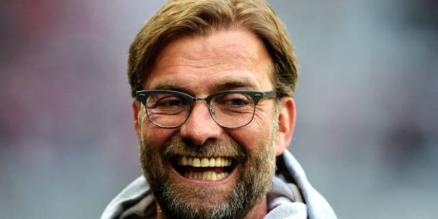 MUNICH, GERMANY - APRIL 28: Juergen Klopp head coach of Dortmund looks happy prior to thr start of the DFB Cup semi final match between FC Bayern Muenchen and Borussia Dortmund at Allianz Arena on April 28, 2015 in Munich, Germany. (Photo by Matthias Hangst/Bongarts/Getty Images)