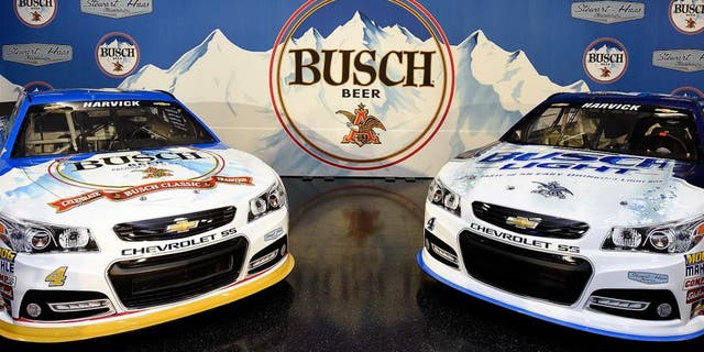 KANNAPOLIS, NC - OCTOBER 08: The #4 Busch Chevrolet and the #4 Busch Light Chevrolet sit in the auditorium after a press conference with Busch and Stewart-Haas Racing at Charlotte Motor Speedway on October 8, 2015 in Kannapolis, North Carolina. The brand will return to NASCAR, reigniting its storied history in the sport by sponsoring Kevin Harvick and the No. 4 team of Stewart-Haas Racing for select races beginning with the 2016 NASCAR Sprint Cup Series season. (Photo by Jared C. Tilton/Getty Images for Stewart-Haas Racing)