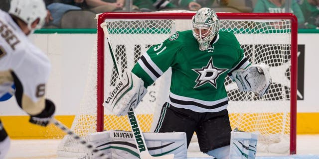 Oct 8, 2015; Dallas, TX, USA; Dallas Stars goalie Antti Niemi (31) makes a save against Pittsburgh Penguins right wing Phil Kessel (81) during the third period at American Airlines Center. The Stars won 3-0. Mandatory Credit: Jerome Miron-USA TODAY Sports