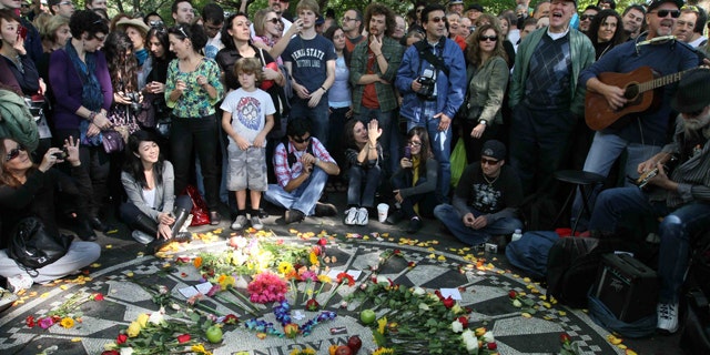 Oct. 9: People sing as they gather around the Imagine mosaic in Strawberry Fields in New York's Central Park, the day that would have been John Lennon's 70th birthday.