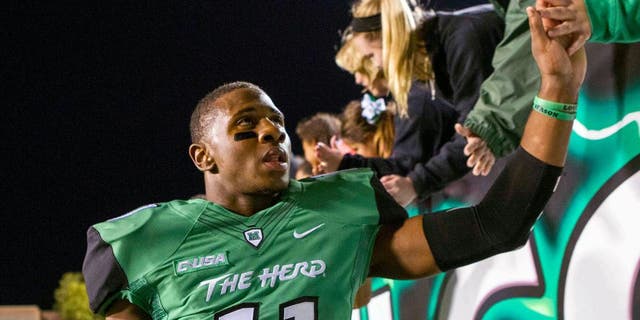 Oct 9, 2015; Huntington, WV, USA; Marshall Thundering Herd defensive back Rodney Allen (11) celebrates beating Southern Miss Golden Eagles at the end of the game at Joan C. Edwards Stadium. Marshall won the game 31-10. Mandatory Credit: Ben Queen-USA TODAY Sports
