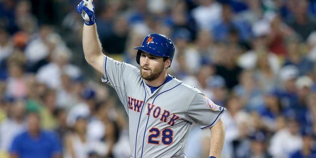 LOS ANGELES, CA - OCTOBER 09: Daniel Murphy #28 of the New York Mets reacts after he hits a solo home run in the fourth inning against the Los Angeles Dodgers in game one of the National League Division Series at Dodger Stadium on October 9, 2015 in Los Angeles, California. (Photo by Stephen Dunn/Getty Images)