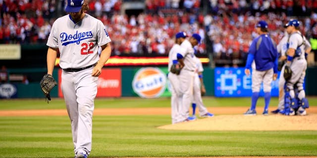 ST LOUIS, MO - OCTOBER 07: Clayton Kershaw #22 of the Los Angeles Dodgers exits the game in the seventh inning after giving up a three run home run against the St. Louis Cardinals in Game Four of the National League Divison Series at Busch Stadium on October 7, 2014 in St Louis, Missouri. (Photo by Jamie Squire/Getty Images)