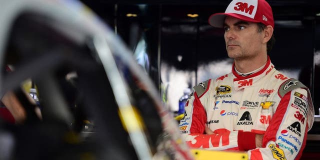 CHARLOTTE, NC - OCTOBER 09: Jeff Gordon, driver of the #24 3M Chevrolet, stands in the garage arstands in the garage areaduring practice for the NASCAR Sprint Cup Series Bank of America 500 at Charlotte Motor Speedway on October 9, 2015 in Charlotte, North Carolina. (Photo by Jared C. Tilton/NASCAR via Getty Images)