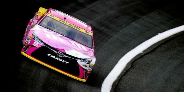 CHARLOTTE, NC - OCTOBER 08: Kyle Busch, driver of the #18 M&M's Pretty In Pink Foundation Toyota, during practice for the NASCAR Sprint Cup Series Bank of America 500 at Charlotte Motor Speedway on October 8, 2015 in Charlotte, North Carolina. (Photo by Robert Laberge/Getty Images)