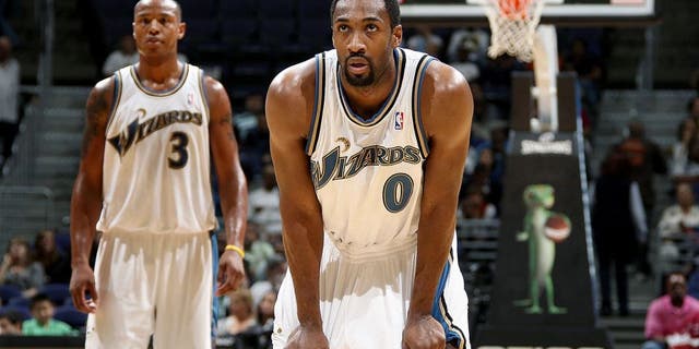 WASHINGTON - OCTOBER 9: Gilbert Arenas #0 (R) and Caron Butler #3 (L) of the Washington Wizards stand on the court during the preseason game against the Dallas Mavericks on October 9, 2009 at the Verizon Center in Washington, D.C. The Mavericks won 123-115. NOTE TO USER: User expressly acknowledges and agrees that, by downloading and/or using this Photograph, user is consenting to the terms and conditions of the Getty Images License Agreement. Mandatory Copyright Notice: Copyright 2009 NBAE (Photo by Ned Dishman/NBAE via Getty Images)