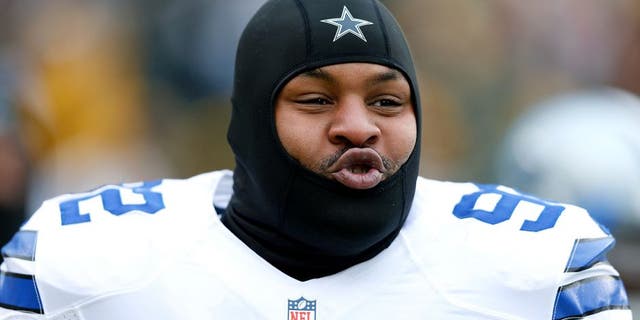 GREEN BAY, WI - JANUARY 11: Jeremy Mincey #92 of the Dallas Cowboys looks across the field during warm-ups prior to the 2015 NFC Divisional Playoff game against the Green Bay Packers at Lambeau Field on January 11, 2015 in Green Bay, Wisconsin. (Photo by Joe Robbins/Getty Images)