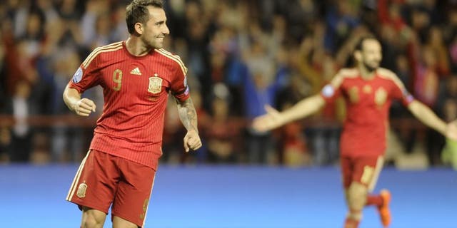 Spain's forward Paco Alcacer (L) celebrates after scoring during the Euro 2016 qualifying football match Spain vs Luxembourg at Las Gaunas stadium in Logrono on October 9, 2015. AFP PHOTO/ ANDER GILLENEA (Photo credit should read ANDER GILLENEA/AFP/Getty Images)