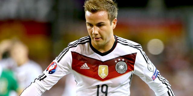 DUBLIN, IRELAND - OCTOBER 08: Mario Goetze of Germany runs with the ball during the UEFA EURO 2016 Qualifier group D match between Republic of Ireland and Germany at the Aviva Stadium on October 8, 2015 in Dublin, Ireland. (Photo by Alexander Hassenstein/Bongarts/Getty Images)