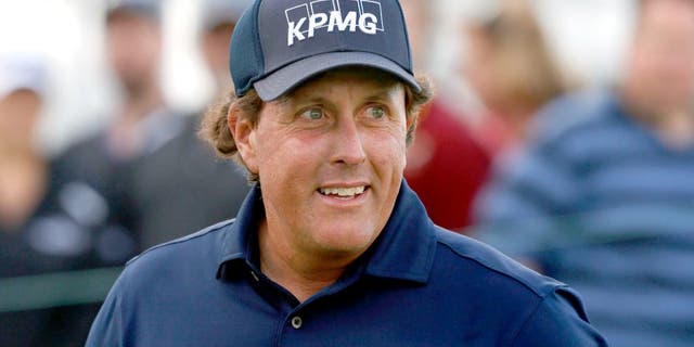 Sep 19, 2015; Lake Forest, IL, USA; PGA golfer Phil Mickelson walks to the 10th tee during the third round at Conway Farms Golf Club. Mandatory Credit: Brian Spurlock-USA TODAY Sports