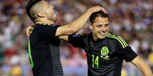 Actio photo during the match Mexico vs United States, Corresponding Playoff Match for FIFA Confederations Cup 2017 CONCACAF Cup 2015 at Rose Bowl Stadium. Foto de accion durante el partido Mexico vs Estados Unidos, partido de Eliminatoria final de la CONCACAF Copa 2015 para el pase a la Copa FIFA Confederaciones 2017 en el Rose Bowl Stadium, en la foto:Javier -El CHicharito- Hernandez celebra su gol de Mexico 10/10/2015/MEXSPORT/David Leah.
