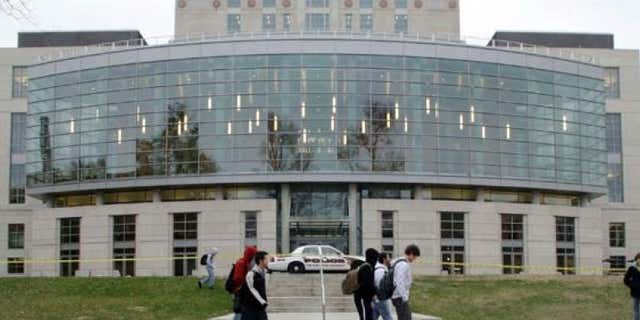 Nov. 16, 2010: Students walk past a closed library at Ohio State University in Columbus, Ohio. The school evacuated the main library, along with three other academic buildings, after the FBI received an e-mailed bomb threat targeting the university.