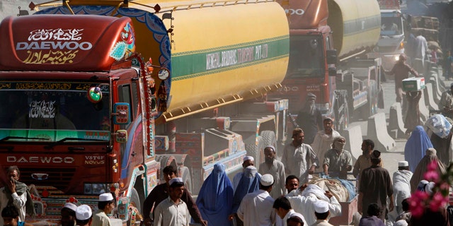 Oct. 10: NATO fuel tankers enter Afghanistan through Pakistan's border crossing in Torkham, east of Kabul.