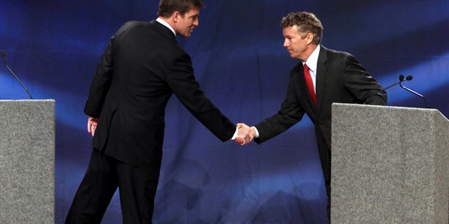 Oct. 11: Kentucky Senate candidates Democrat Jack Conway, left, and Republican Rand Paul, right, shake hands at the end of their debate at Northern Kentucky University in Highland Heights, Ky.