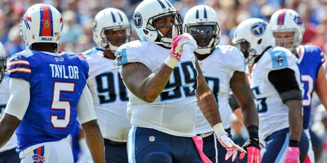 Oct 11, 2015; Nashville, TN, USA; Tennessee Titans defensive end Jurrell Casey (99) reacts to stopping Buffalo Bills running back Boom Herron (38) (not pictured) behind the line during the first half at Nissan Stadium. Mandatory Credit: Jim Brown-USA TODAY Sports