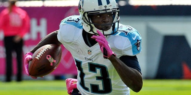 Oct 11, 2015; Nashville, TN, USA; Tennessee Titans wide receiver Kendall Wright (13) rushes against the Buffalo Bills during the first half at Nissan Stadium. Mandatory Credit: Jim Brown-USA TODAY Sports