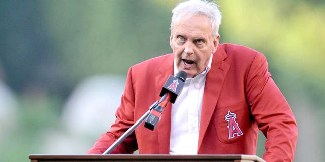 August 22, 2015; Anaheim, CA, USA; Former Los Angeles Angels player Dean Chance speaks at his Angels hall of fame induction before the game against the Toronto Blue Jays at Angel Stadium of Anaheim. Mandatory Credit: Gary A. Vasquez-USA TODAY Sports