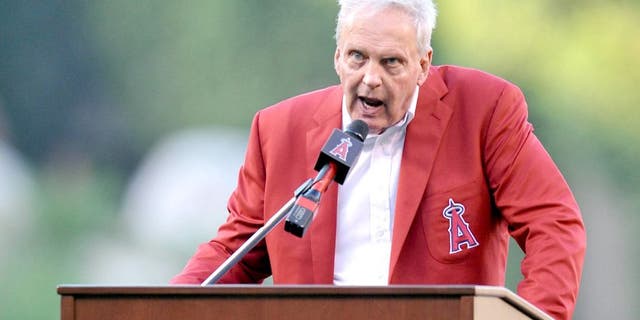 August 22, 2015; Anaheim, CA, USA; Former Los Angeles Angels player Dean Chance speaks at his Angels hall of fame induction before the game against the Toronto Blue Jays at Angel Stadium of Anaheim. Mandatory Credit: Gary A. Vasquez-USA TODAY Sports